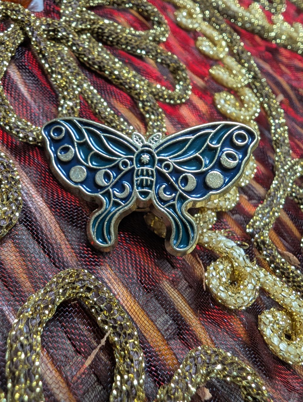 Lunar cycle moth pin 